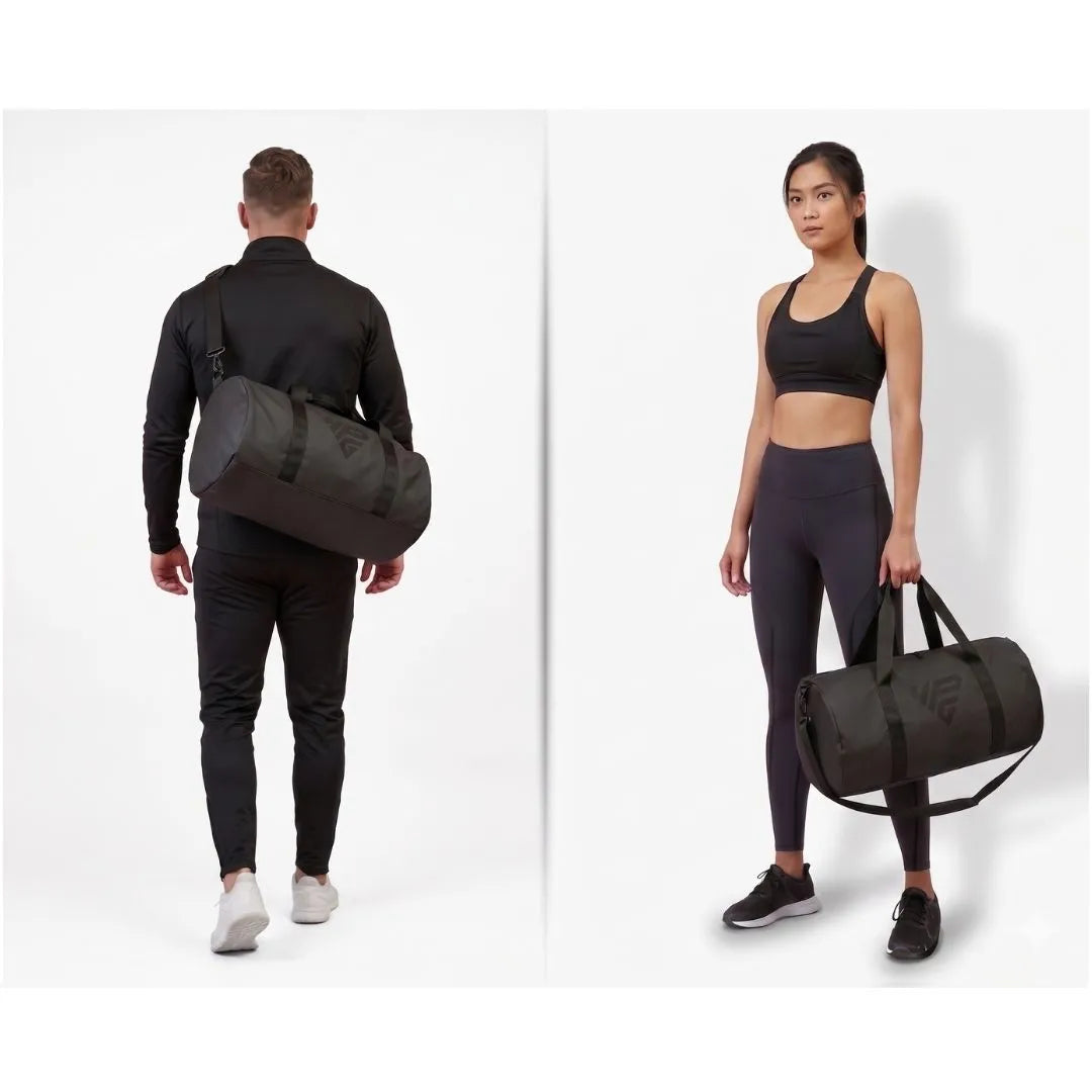 Two people carrying the GymRoam 30L Duffle Bag, one crossbody and one by the top handles