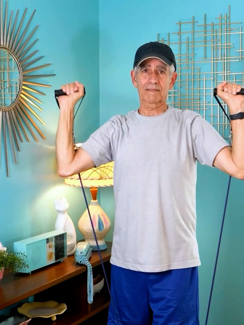 Showing HomeProGym stackable resistance bands. 9 bands stacking to 450 pounds of resistance. A man and woman performing various exercises with tube bands stacked for heavy resistance