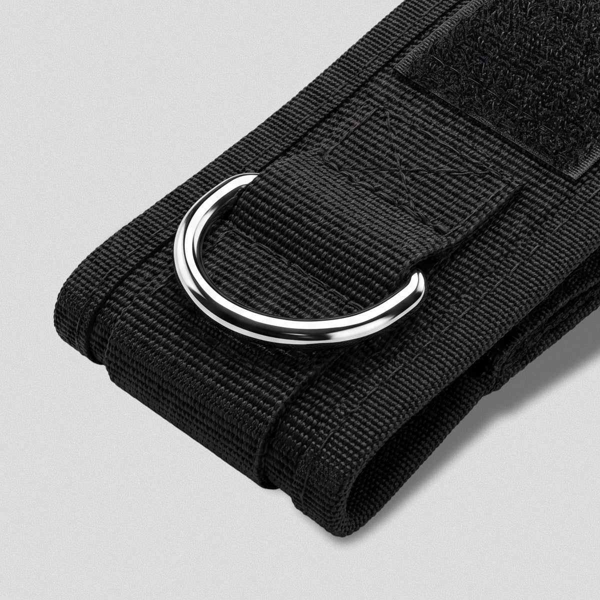Steel D-ring stitched into the nylon of an Ankle Strap.