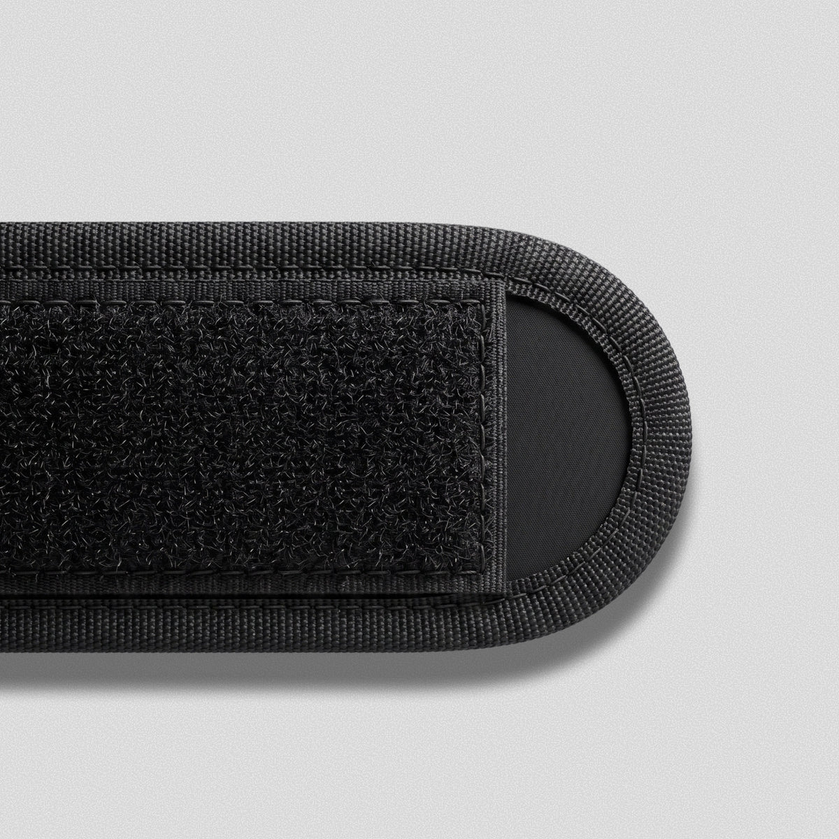 Hook-and-loop closure panel and padded edge of an Ankle Strap.