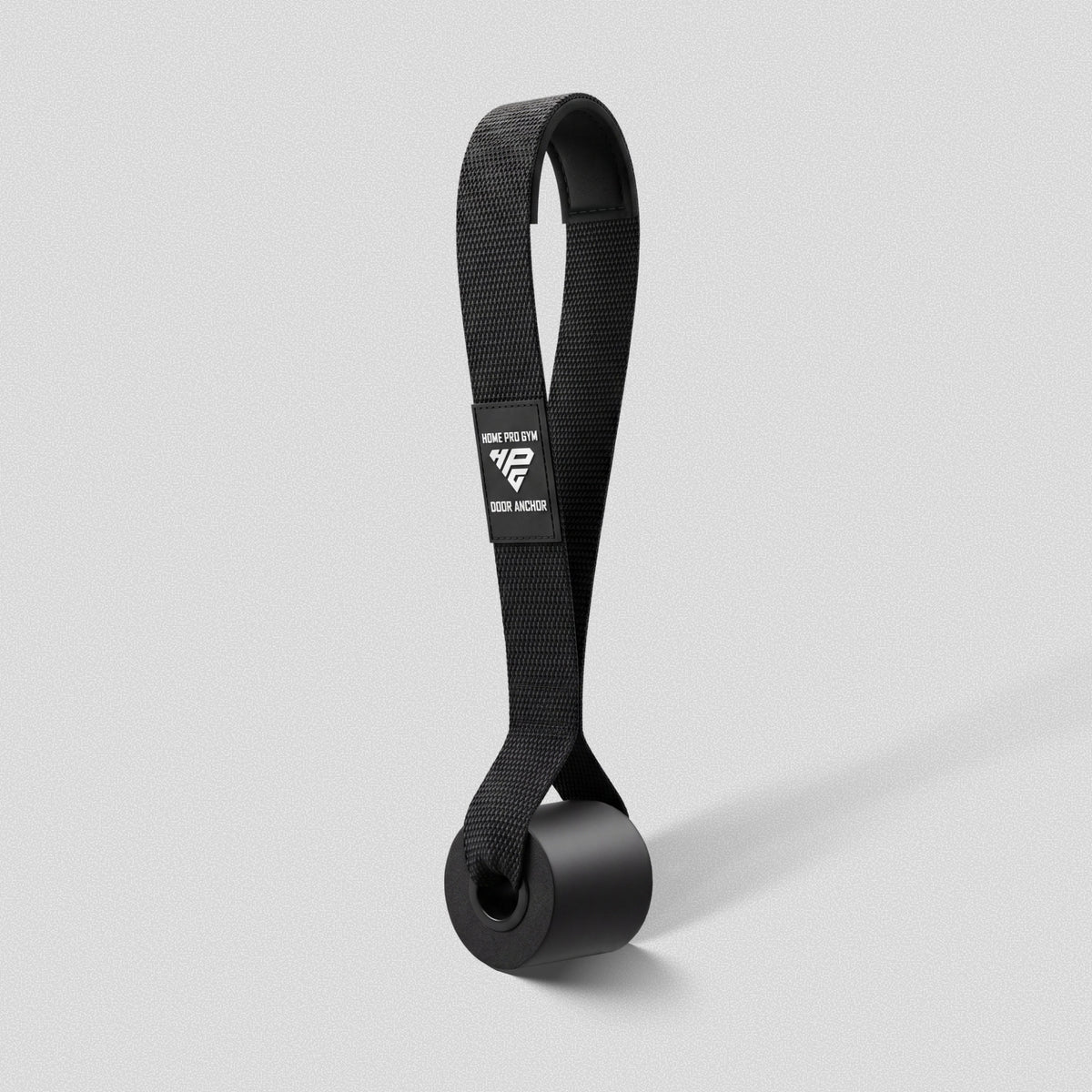 HomeProGym Door Anchor: black nylon loop strap with a foam stopper and steel grommet.