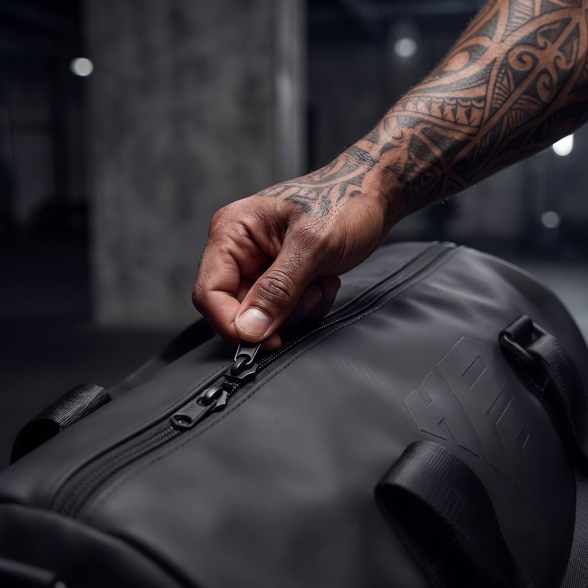 Hand opening the main zip of the GymRoam 30L Duffle Bag.