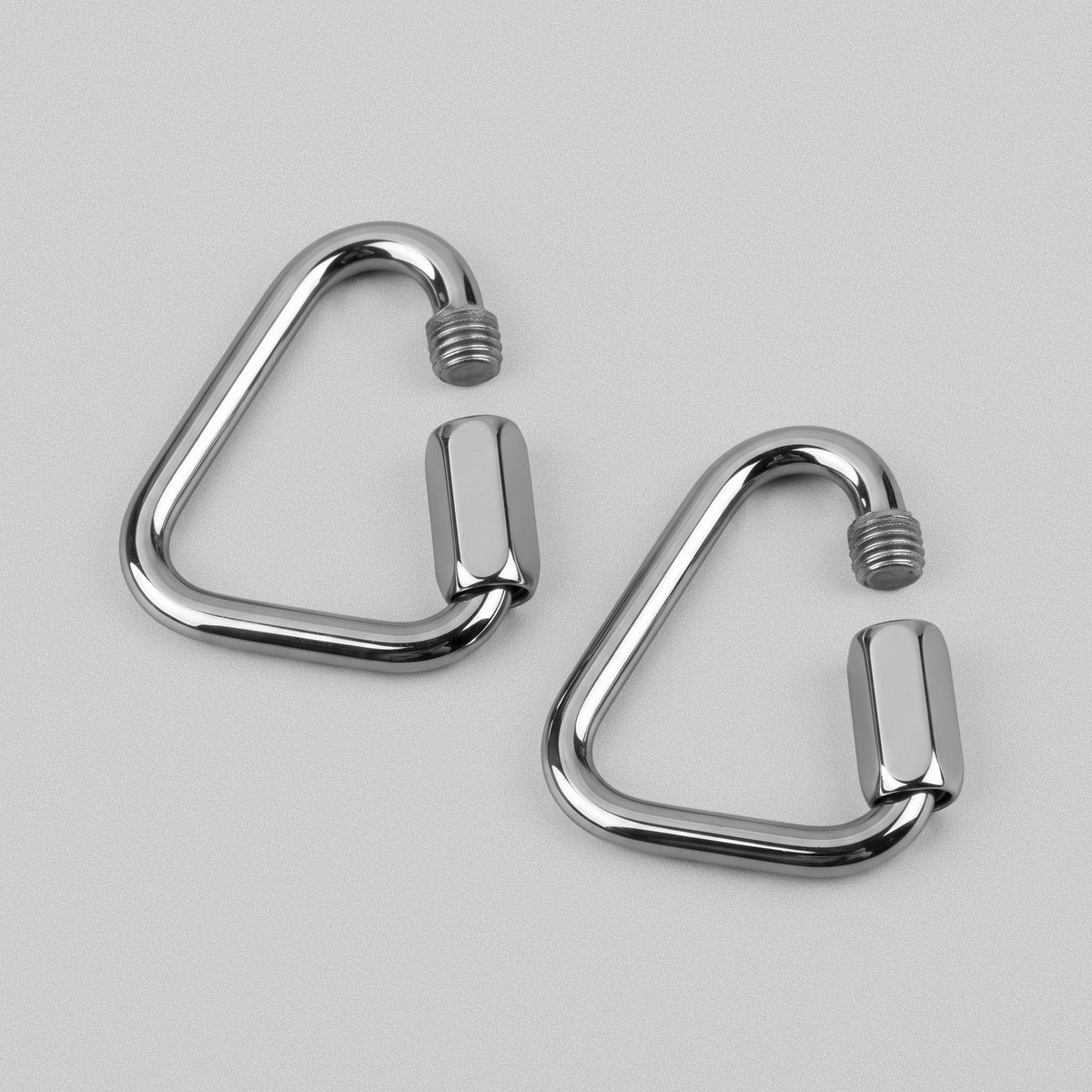Two Power Band Carabiners with the screw gates opened.