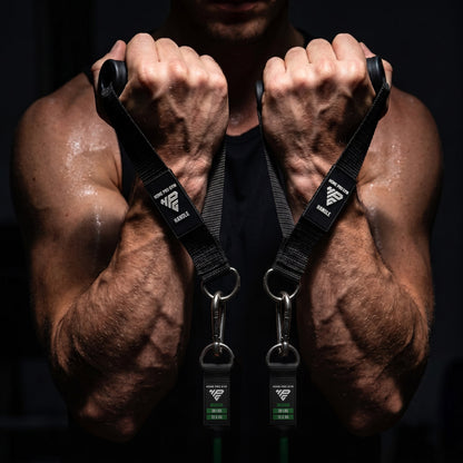 Hammer curl with the Premium Handles, both bands pulled tight.