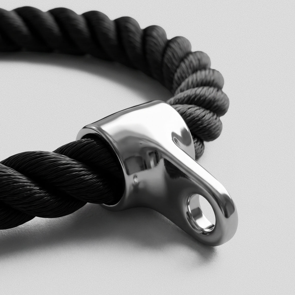 Polished steel attachment on the Tricep Rope where the carabiner clips through.