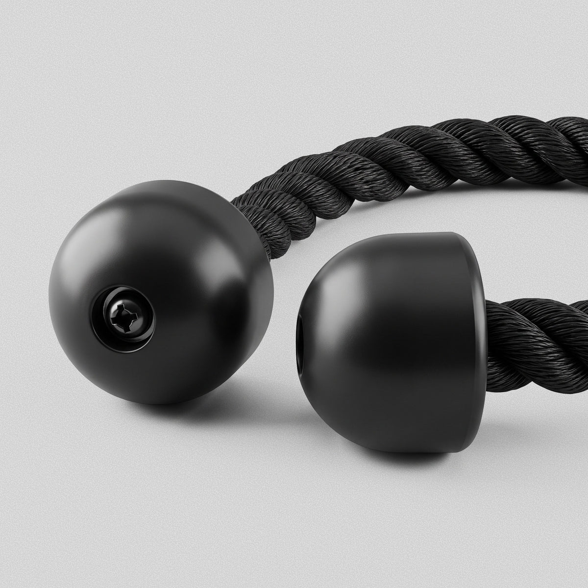 Solid rubber end caps on the Tricep Rope that stop the hands slipping off.