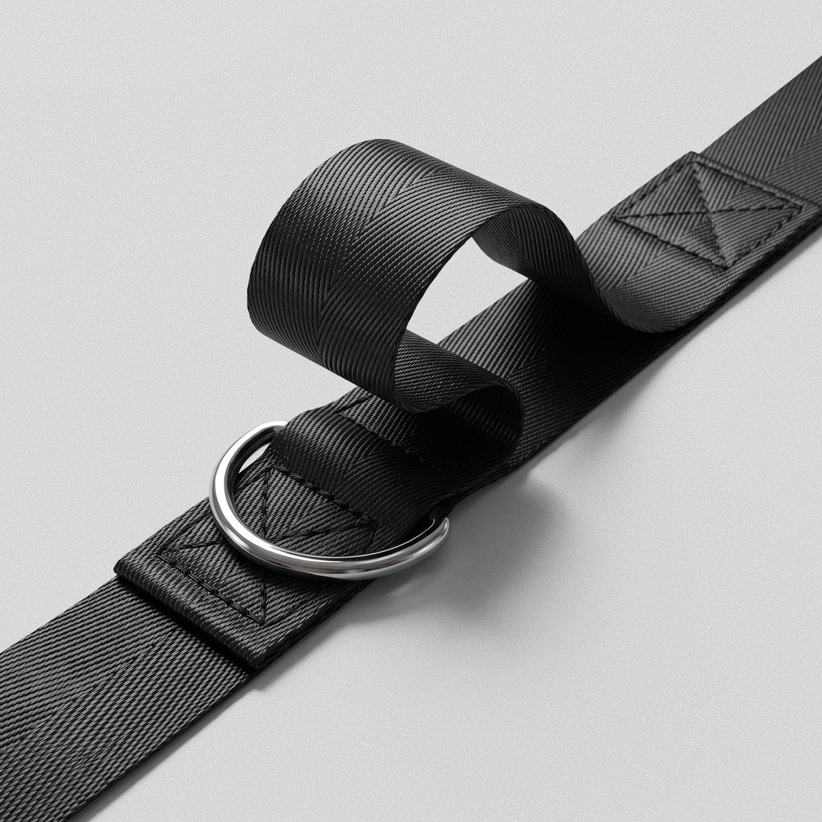 Stitched loop and steel D-ring on the Ultra Door Anchor where a carabiner clips in.