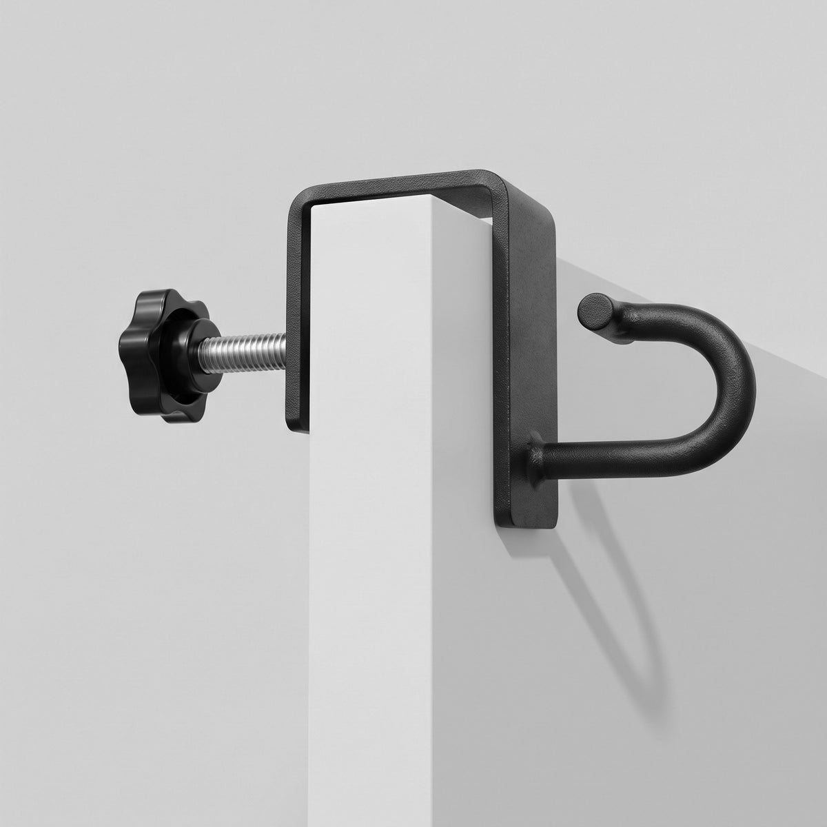 Ultra Door Mount clamped to the top edge of a door, hook ready for a band.