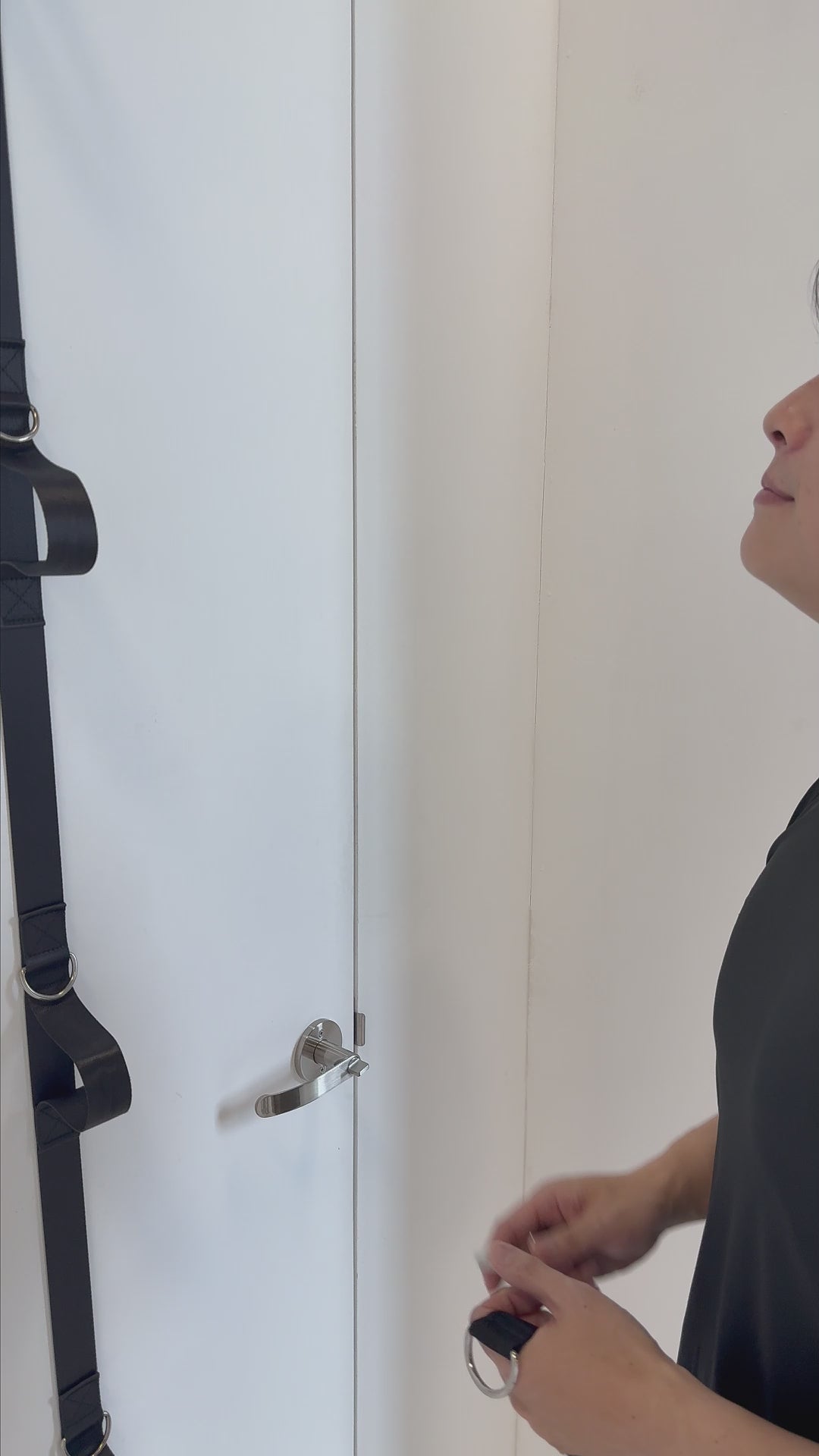 Video: clipping the LiteRope Foldable Tricep Rope to HomeProGym Resistance Bands on a door anchor and pressing down