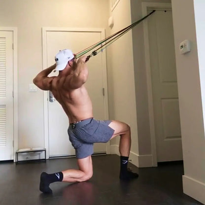 Man performing face pulls exercise with HomeProGym PowerTube stackable resistance bands at home